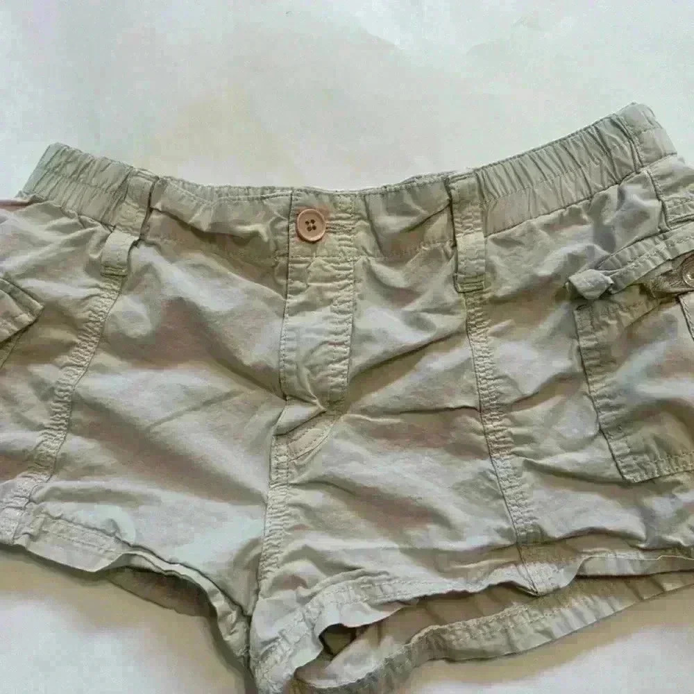 Short khaki BDG cargo shorts.  Horribly wrinkled